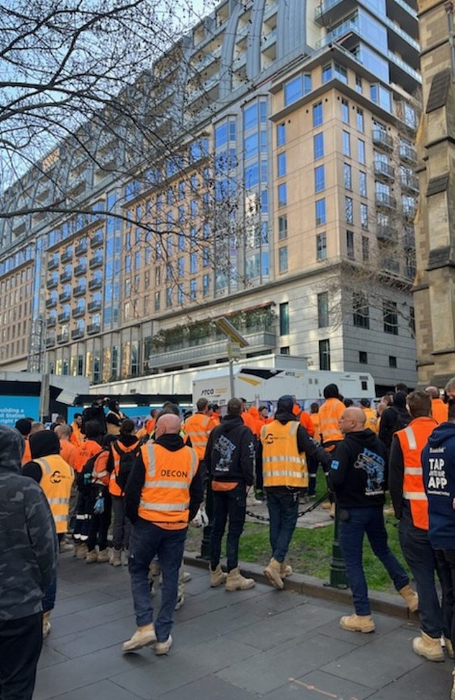 Workers gather outside Westin after a standoff with police and a man armed with a knife. Picture: Supplied