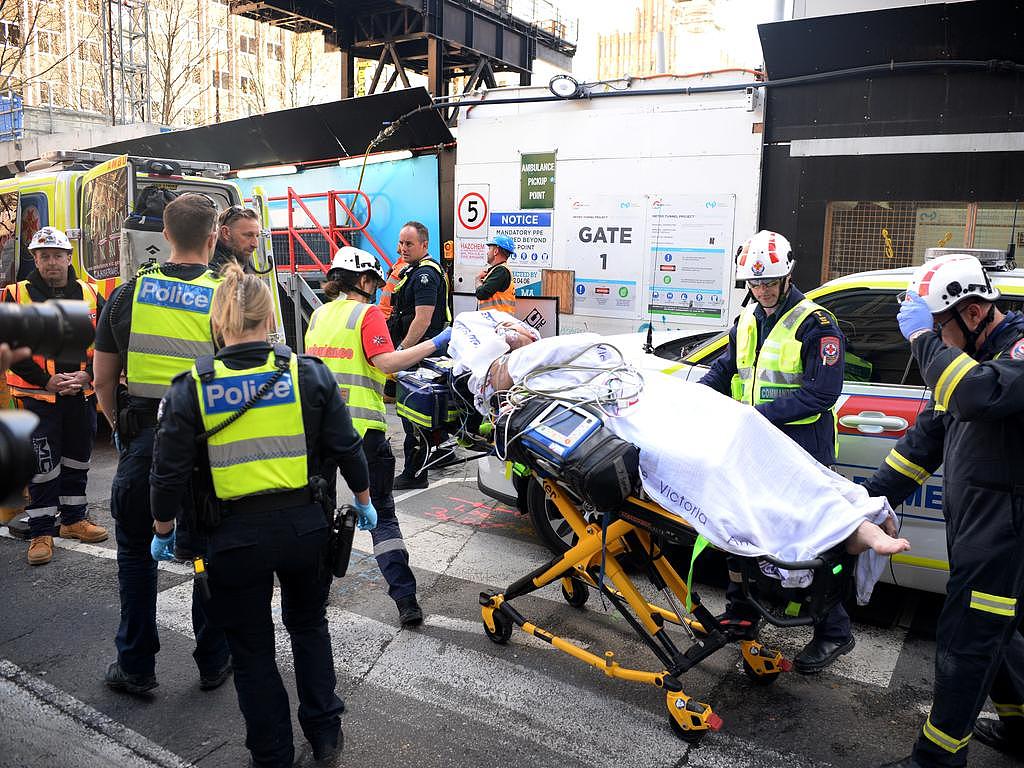 Emergency services respond to a man allegedly armed with a knife running through the metro station being constructed above the city square. Picture: NewsWire / Andrew Henshaw