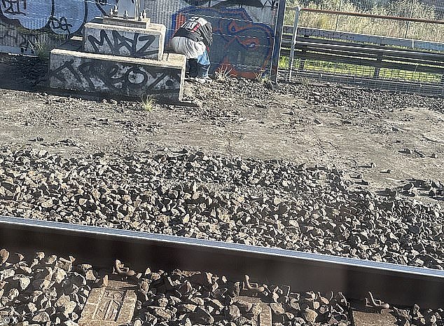 Sydney Trains are experiencing major delays this morning due to a man on the tracks near Redfern Station