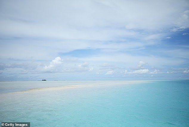 Formerly known as the Ellice Islands, Tuvalu is located in the Pacific Ocean, roughly halfway between Hawaii and Australia. Pictured: A view out to sea from Funafuti