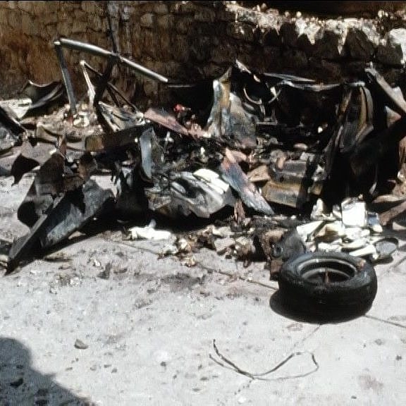 A mess of car parts that are charred