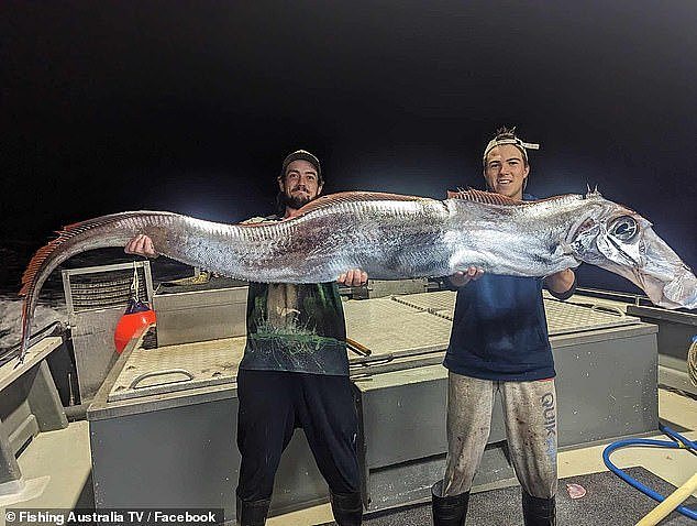 Curtis Peterson, from Tiwi Islands Adventures, and a young angler with their rare catch.