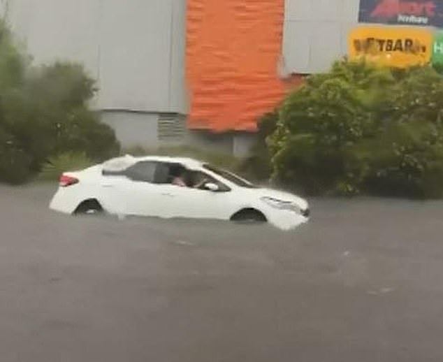 Footage shared on social media showed cars submerged in deep, fast-flowing water outside a shopping mall in Frankston in Melbourne 's south east