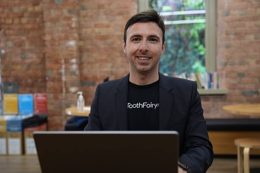 A startup boss sitting at his computer in a co working space at Stone and Chalk in Melbourne 