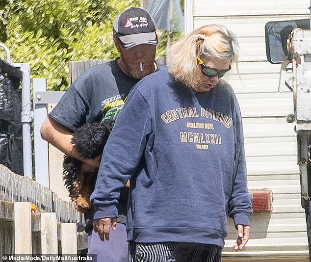 Jamie McCulloch and Jacinta King pictured this week outside their caravan home in Devonport