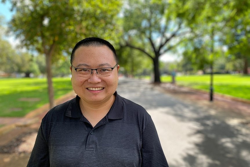 Man standing in a park 