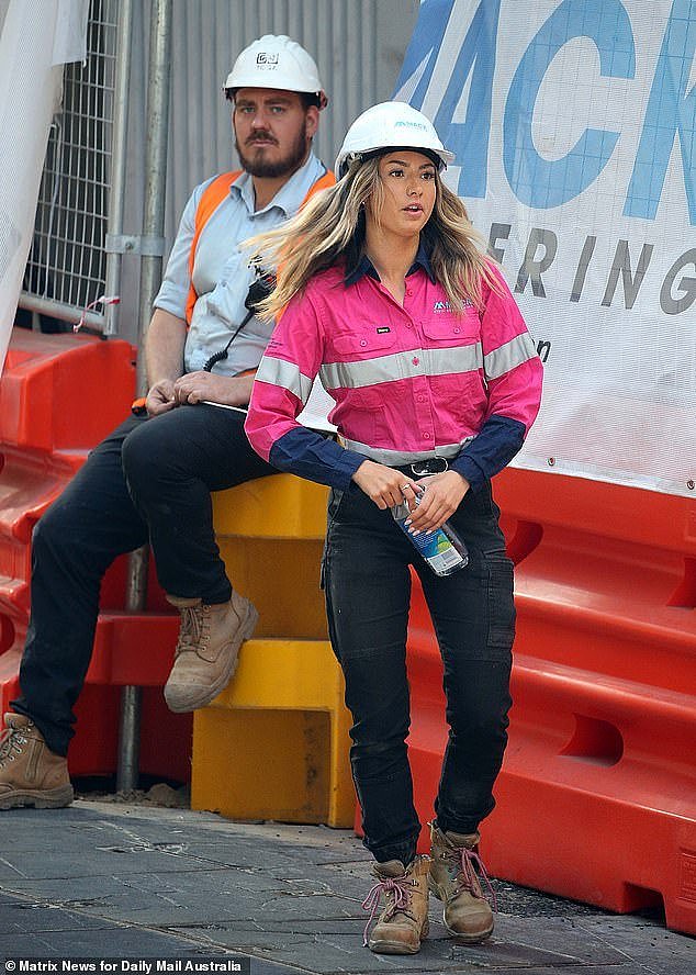 Australian women will work for free for the rest of the year if the gender pay gap is taken into account, a powerful trade union has claimed (pictured, a tradie works in Sydney)