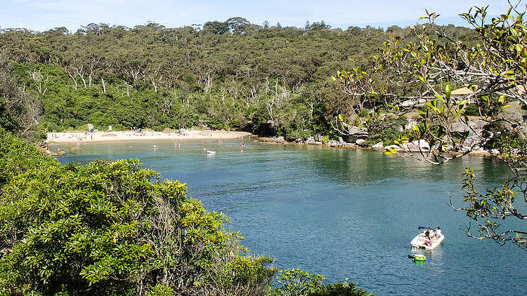 Lay a towel out at hidden Collins Flat Beach