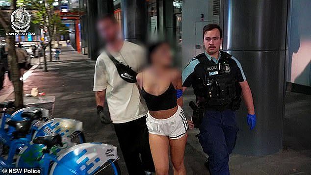 The officers were part of a state-wide 'dial-a-dealer' operation, with more than 100 people arrested including a young woman in Sydney's CBD (pictured)