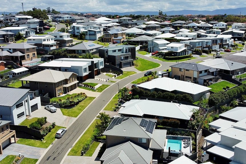 A drone shot of rows of houses in Shell Cove, Wollongong's south.