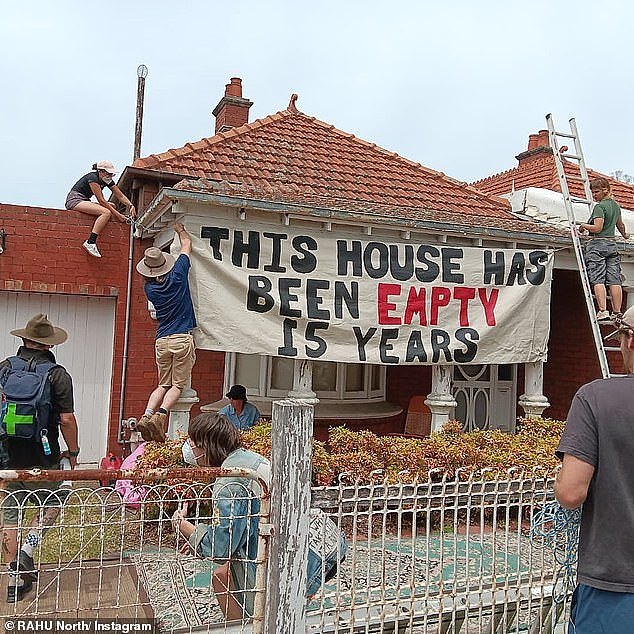 Jordan van den Lamb, known online as PurplePingers, staged a protest along with other activists at three adjacent homes that had been vacant for more than two decades