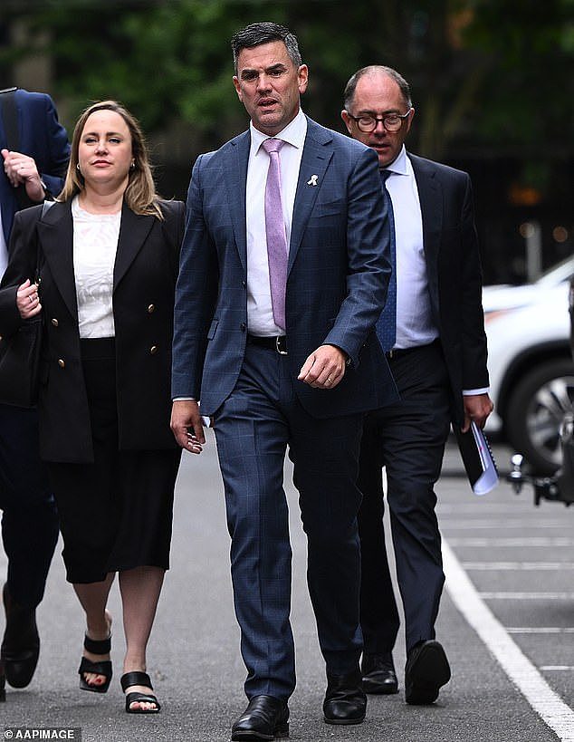 Brad Battin (centre) is the Victorian opposition's new leader