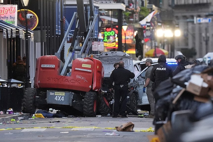 The wreckage of a car slammed into the front of a cherry picker on a New Orleans street.