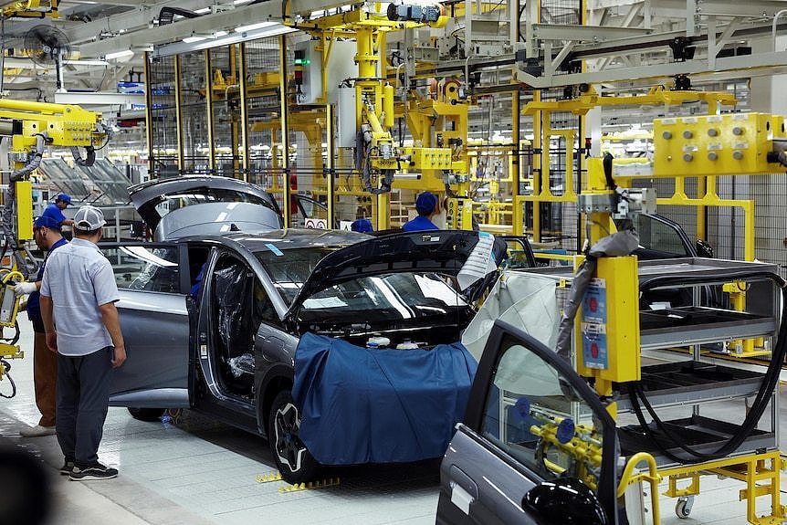 workers in a car factory