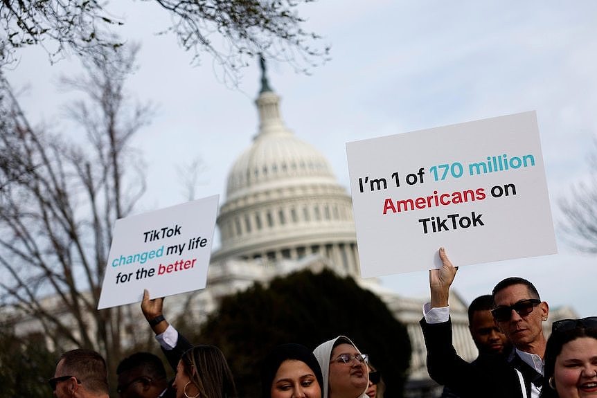 Protestors in Washington hold signs like 'I'm one of 170 million Americans on TikTok'