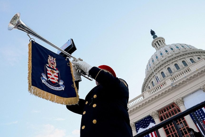 A trumpeter plays this trumpet outside the US Capitol building