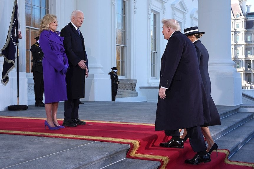 trump walk towards biden