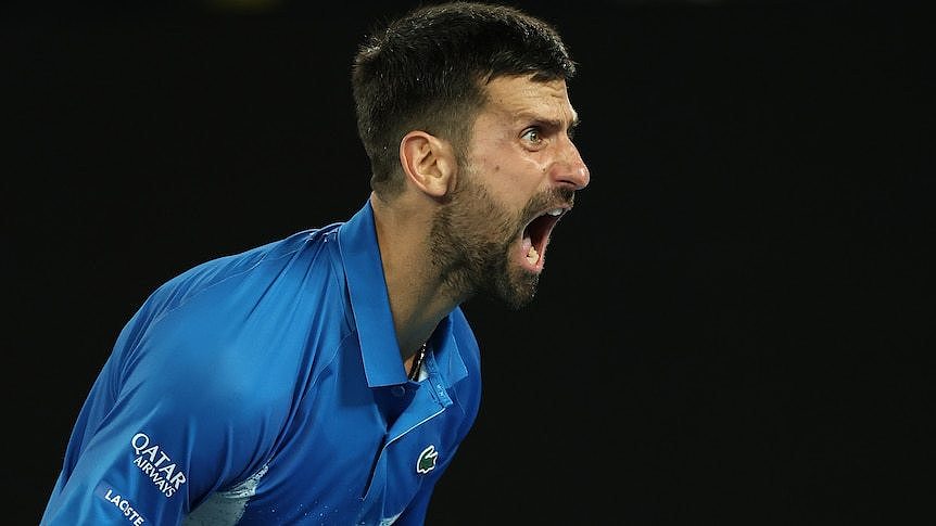 Novak Djokovic roars in celebration after his win