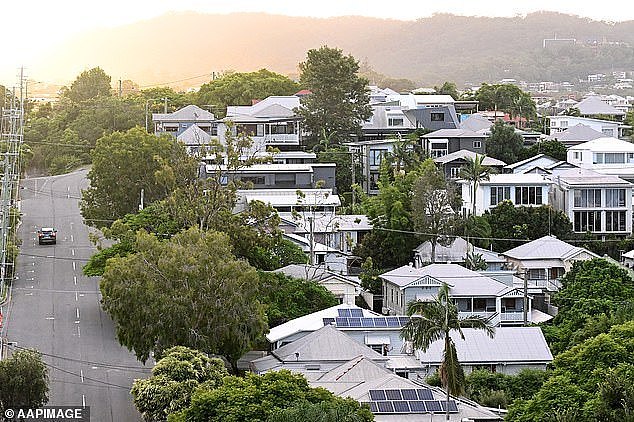 Every major bank is now expecting the Reserve Bank of Australia to cut rates on February 18 with inflation moderating to surprisingly low levels (pictured are houses in the inner-Brisbane suburb of Milton)