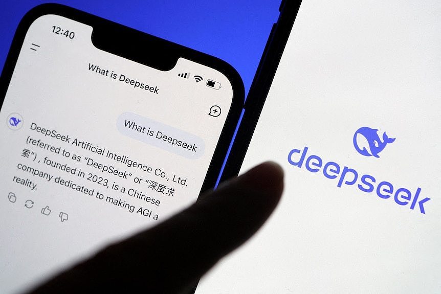 Two mobile phones, one showing the DeepSeek AI chatbot interface and the other showing the DeepSeek logo.