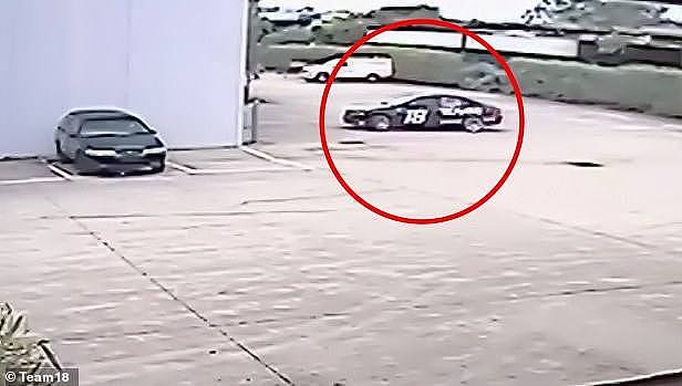 A Supercars team has released CCTV of the moment its mule car used for pitstop practice was stolen in a brazen daylight robbery (pictured, circled in red)