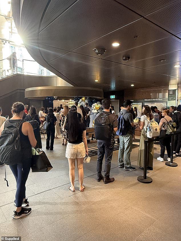 At the end of this queue? The eagerly anticipated second location of Parisian bakery Loulou, Petit Loulou, handing out free croissants to fans