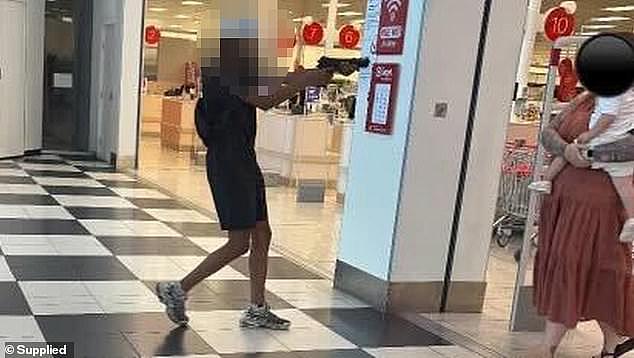 The boy was one of three, aged 13, 14 and 16, who allegedly stole fake guns and pointed them at shoppers in Somerville Central Shopping Centre at about 10.40am on February 6