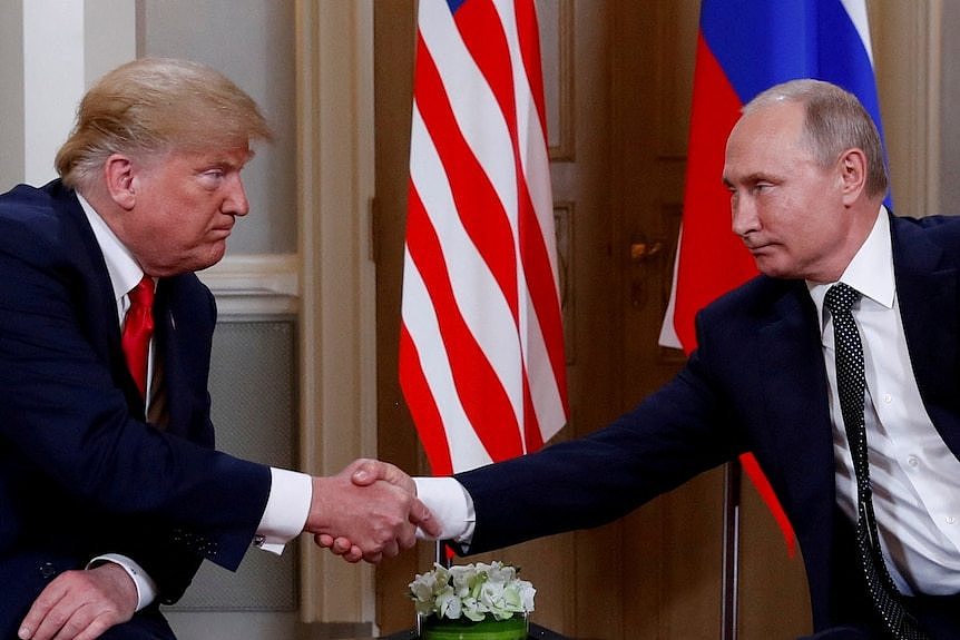 Donald Trump shaking hands with Vladimir Putin 