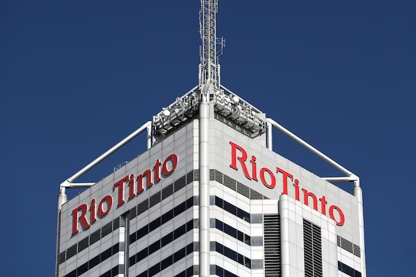 a white skyscrapper with rio tinto 