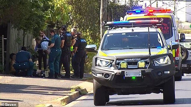 A woman has been shot dead at a home in North Toowoomba less than 150 metres from a primary school