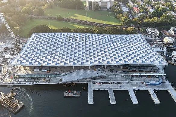 The roof comprises 400 panels arranged to resemble fish scales.