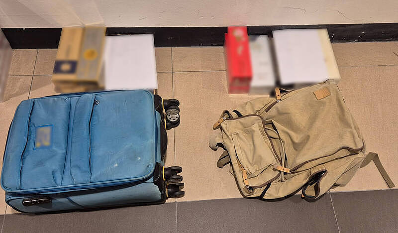 称只带10包!中国男子走私218条香烟入境新加坡被捕(组图) - 2