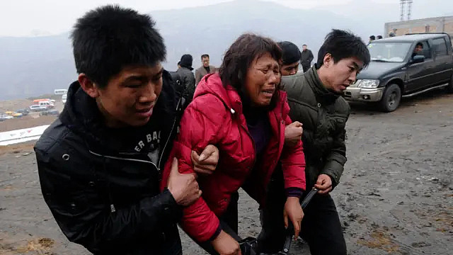 秘密隧道与非法劳工：中国煤难令人想起黑暗的过去（组图） - 1