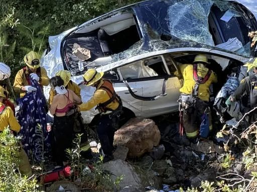 特斯拉Model 3从91米高悬崖坠落！车上2人被直升机送医，均无生命危险（图） - 1