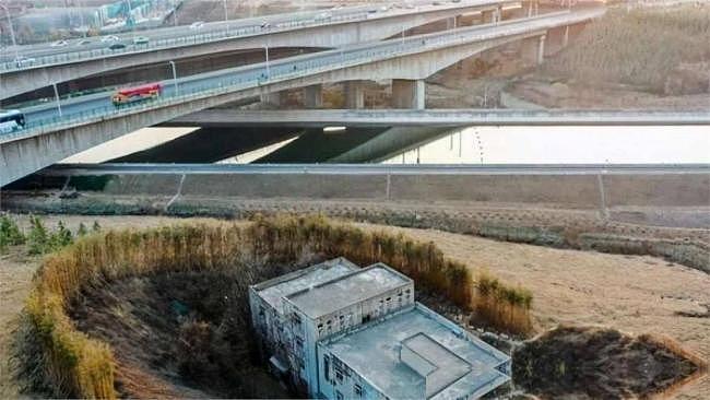 拒绝为南水北调让道!中国“最牛钉子户”现在怎样了?(组图) - 1