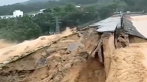 “洪水来得太快了”:台风在中国引发水灾及罕见龙卷风(组图) - 1