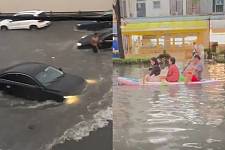 中国上海暴雨“马路变黄河”，汽车全泡垃圾水、民众划小桨出门（图）