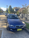 2002年 蓝色马自达 626L 三厢轿车