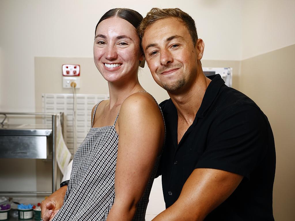 Ms Shaw and her partner Denam Glasson, pictured just hours beforethe life-changing surgery. Picture: Richard Dobson