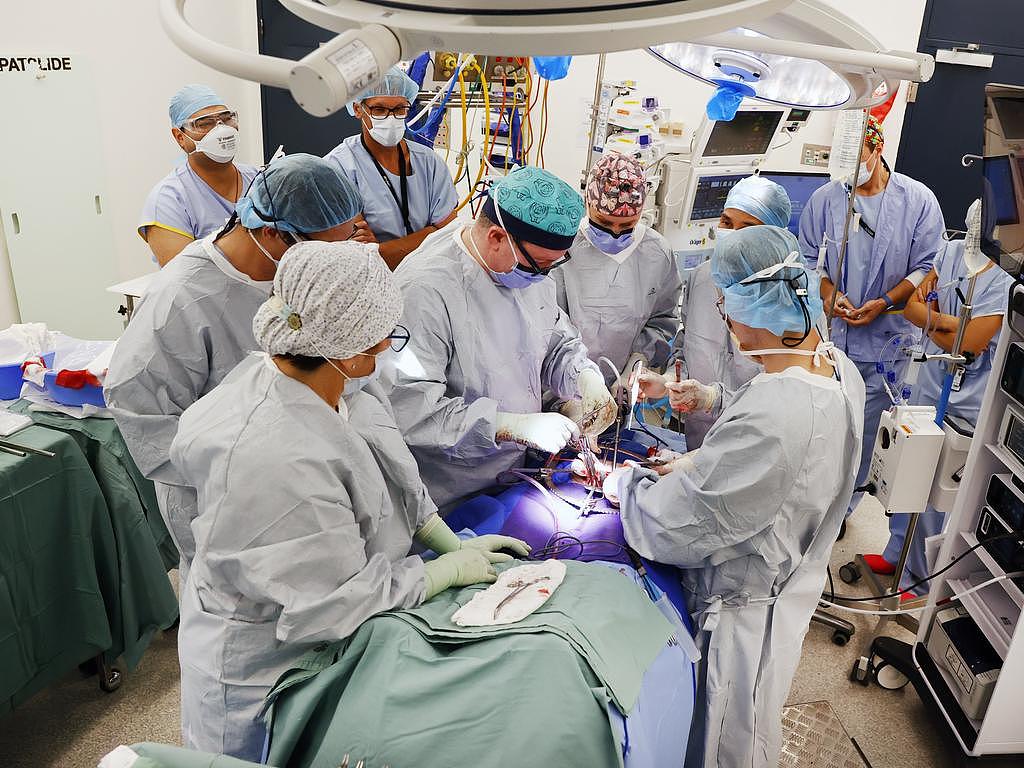 RPA surgeons in the midst of the groundbreaking surgery to remove Ms Miller’s donor uterus and transplant it to Ms Shaw. Picture: Richard Dobson