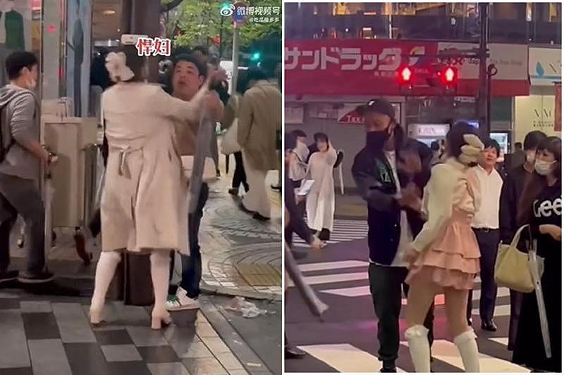 中国女子在东京街头大展“狮吼功”，狂对日本老公扇巴掌，劝架路人也不放过（视频/组图） - 1
