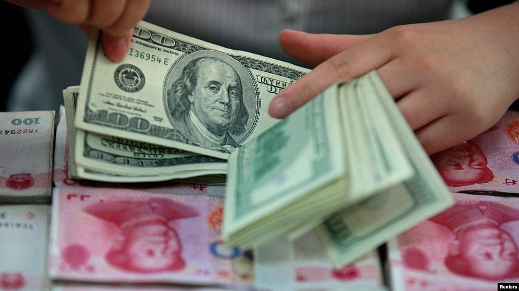 中国推动人民币为跨境贸易结算货币，挖美元主导地位墙角（图） - 1