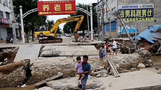 中国水灾：两个家庭诉说家破人亡的悲惨经历（组图） - 4