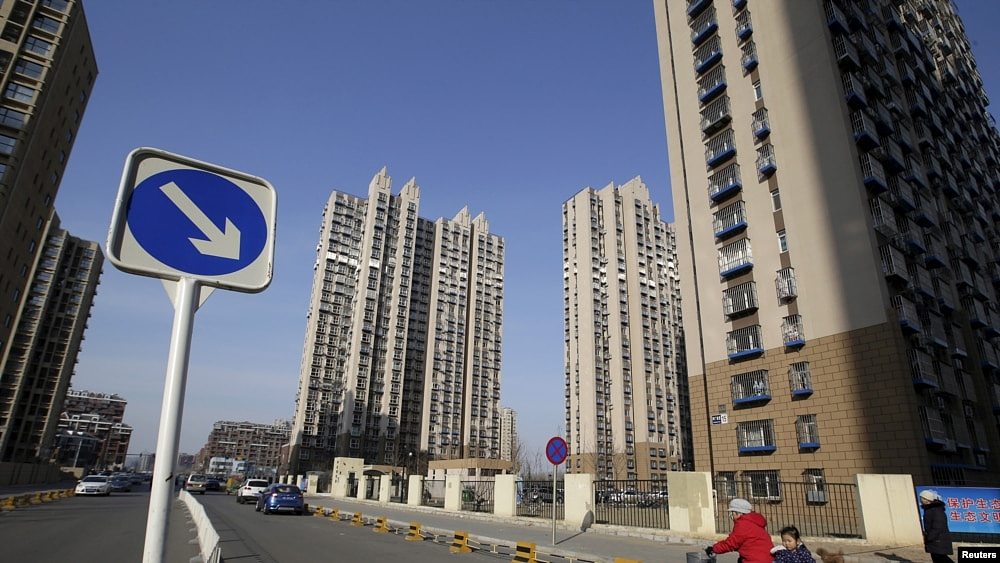 房地产市场病重下猛药，中国多个城市取消住房限购政策（图） - 1