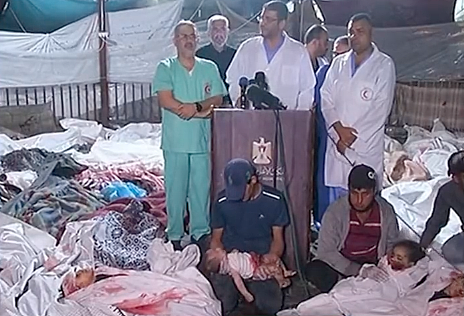 加沙医生挤在“尸袋中间”开记者会，震惊世界（图） - 1