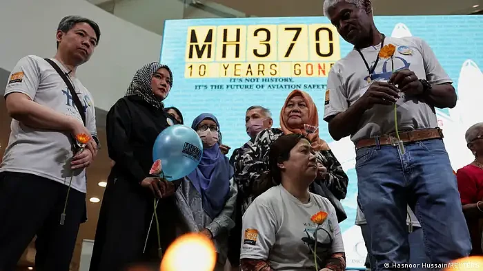 马航MH370失踪十周年，亲人们仍然在等待（组图） - 1
