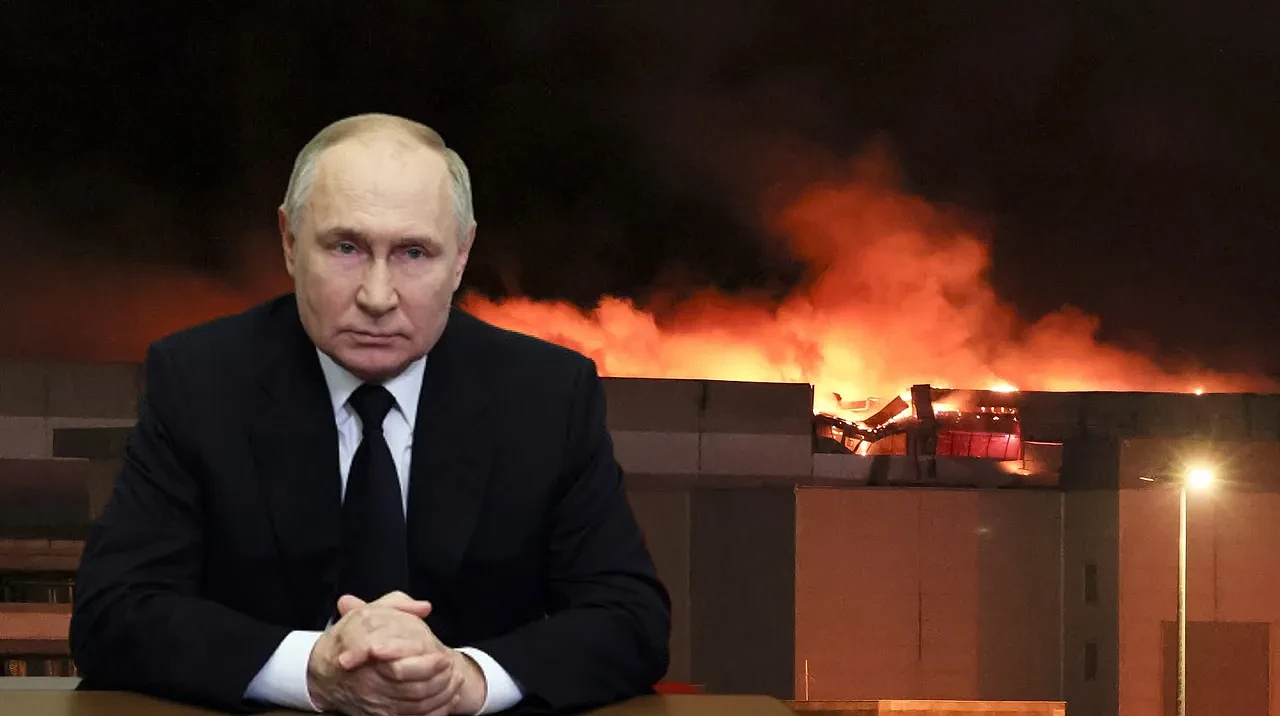 俄罗斯总统普京在全国演讲中只字未提伊斯兰国。合成画面。背景为遭到恐怖分子纵火焚烧的音乐厅。路透社
