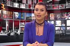 半裸！阿尔巴尼亚电视台女主播惹争议，西装内“露乳”出镜（组图）