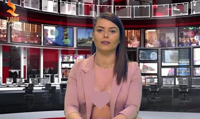 半裸！阿尔巴尼亚电视台女主播惹争议，西装内“露乳”出镜（组图） - 5