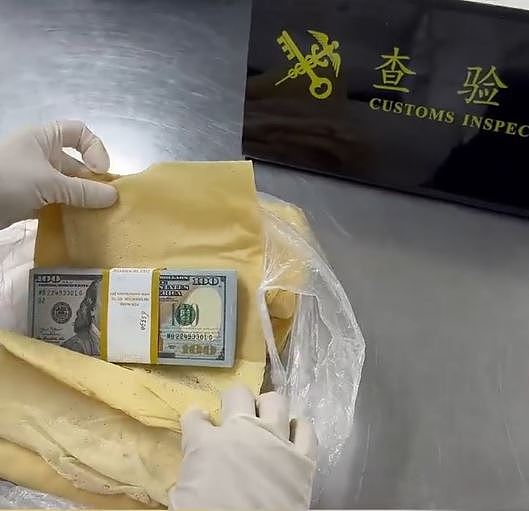 两男书本枕头藏35叠现钞图走私到香港！罗湖海关检33万美元（视频/组图） - 3